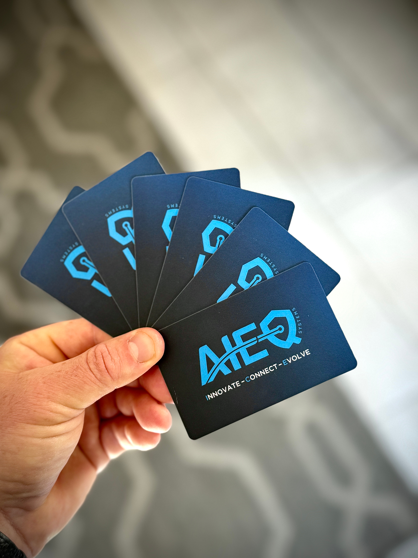 AIEQ Systems blue branded NFC cards